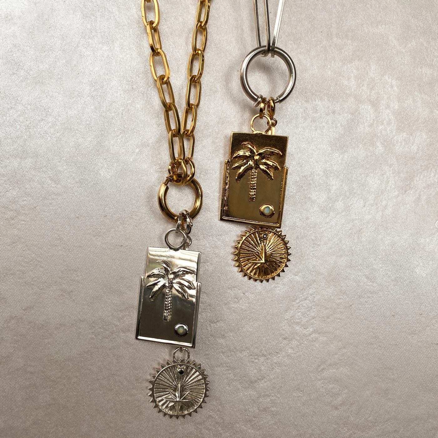 gold and silver medallions rectangular with palm tree and opal colombian jewelry