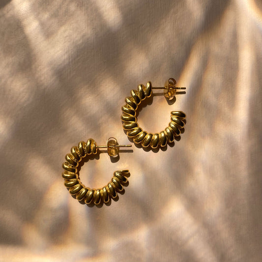 twisted medium hoops gold ana buendia